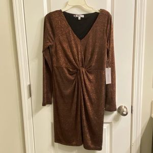 Jennifer Lopez metallic copper dress.